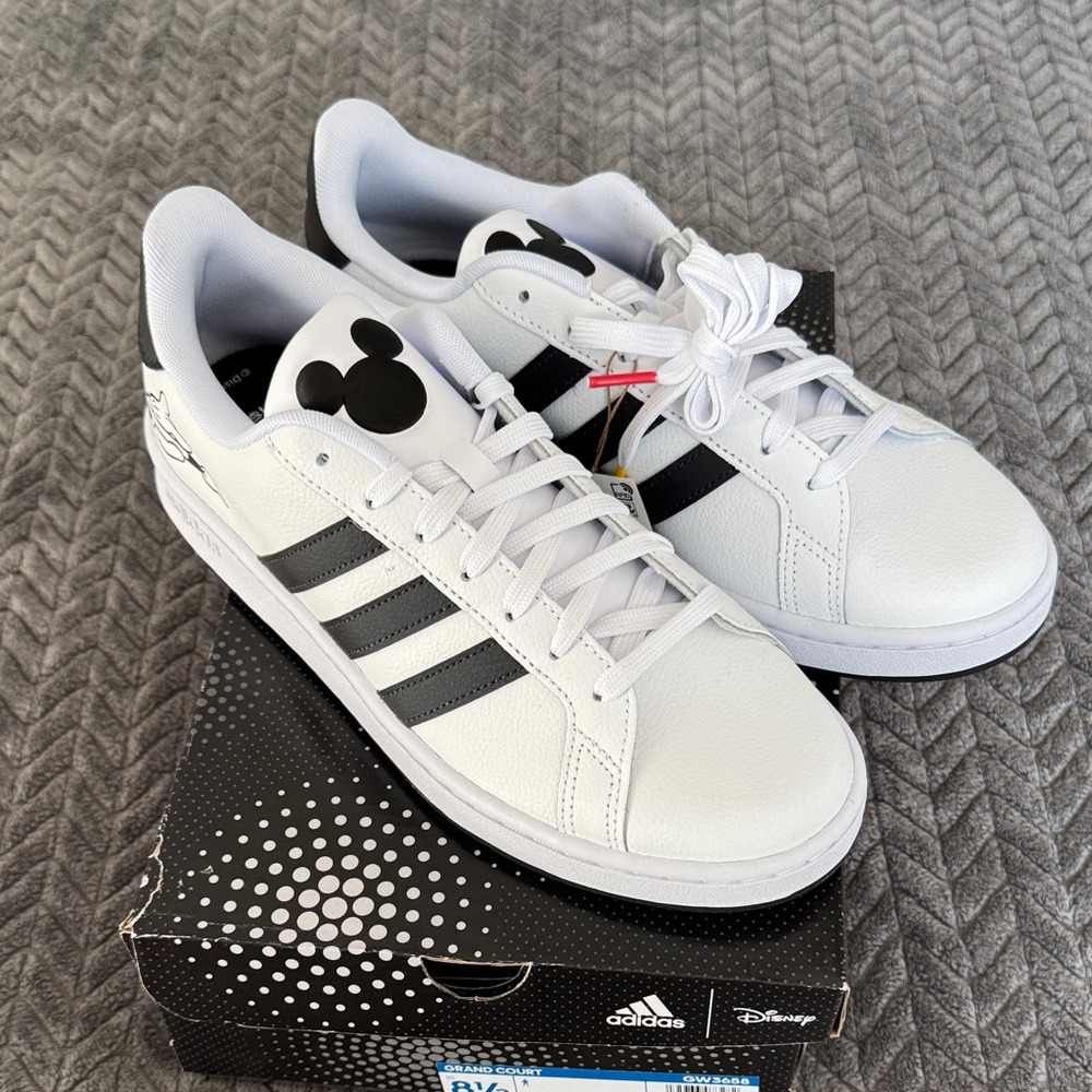 Adidas Woman’s or Men's White and Black Mickey Mouse 
Woman’s 10
Men’s 8.5